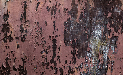 Rusty brown metal sheet with peeling cracked paint, corroded industrial surface texture, grunge...