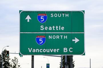 Road sign with Interstate 5 direction information for Seattle and Vancouver BC