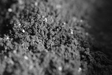 Macro texture of grinder coffee beans as background