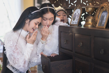 A Group of beautiful Asian women wearing Traditional Lanna Dress with a Western-inspired lace...