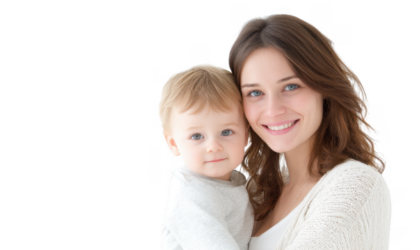 A joyful mother holds her smiling baby in a bright. minimalistic setting. showcasing their bond and happiness. with soft lighting enhancing the warmth of the moment