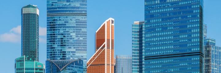 Panorama with skyscrapers. Modern residential and office high-rise buildings. Beautiful wide panoramic background. Close-up. Moscow international business center. Moscow city, Russia.