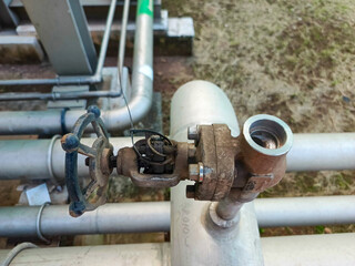 Damaged industrial valve on a pipeline