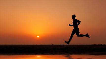 Silhouette of runner at sunrise