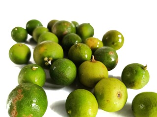 Fresh Guatemalan Limes on White Background Isolated