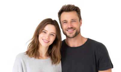 A cheerful couple poses together. smiling warmly at the camera. showcasing their connection and happiness in a bright. neutral setting. ideal for relationship or lifestyle imagery