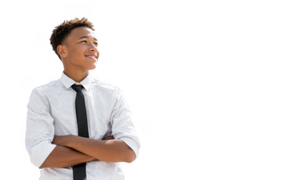 A young man in a white shirt and black tie stands confidently with his arms crossed. smiling while looking off to the side against a bright. plain background. suggesting a professional or celebratory