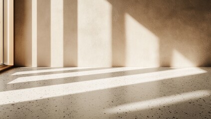 Sunlight streams into a beige room, casting long shadows on a terrazzo floor