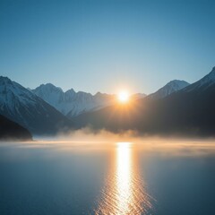 Sunrise Over Misty Lake and Snow Capped Mountains