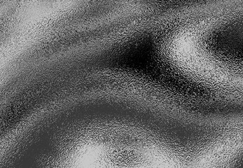 Black Foil with Wrinkled and Textured Surface Abstract Background