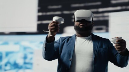African american software developer uses virtual reality headset for coding, high tech interface workspace. Surrounded by terminal windows, representing digital programming culture. Camera B. - Powered by Adobe