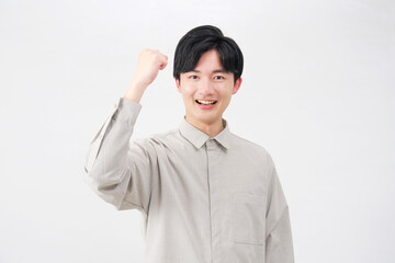 男性　20代　ガッツポーズ　白背景