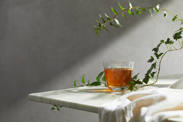 Minimal Aesthetic Beverages in Natural Light with Greenery.