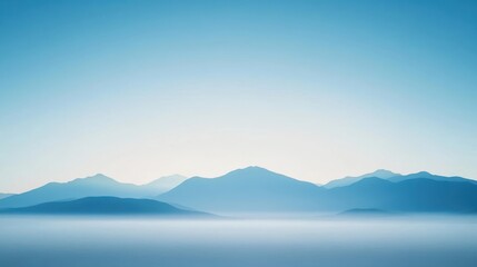 Serene Mountain Range Overlooking a Calm Sea Under a Clear Sky