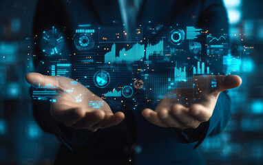 Fototapeta premium Hands presenting glowing digital data charts and graphs in a futuristic style