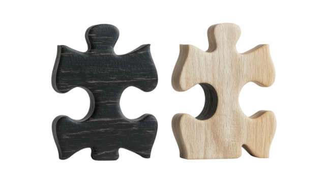 two black and white puzzle pieces on white background