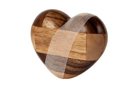 Wooden heart with bandage, healing concept.