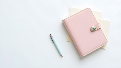 Elegant pink diary paired with a pen, symbolizing creativity, journaling, and personal expression&mdash;perfect for stationery lovers and productivity themes.
