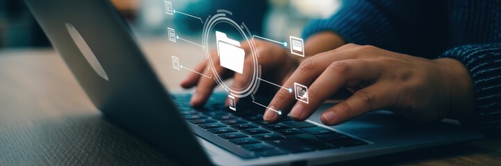 Close-up of hands typing on a laptop keyboard, with digital folder icons overlayed.