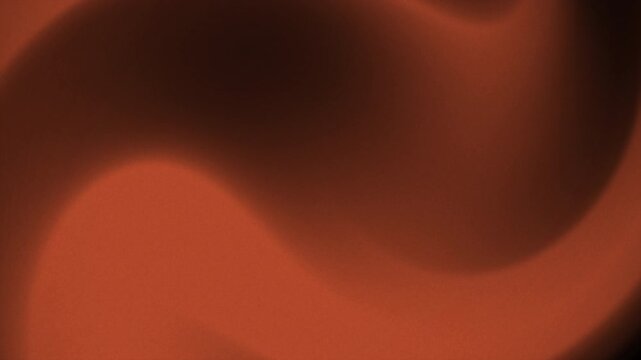 Abstract brown swirling gradient background animation with a smooth, flowing appearance.