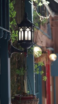 Lanterns illuminating a charming street at dusk