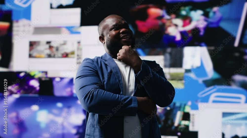 Poster smiling african american influencer being connected on vibrant digital interfaces and visualizations