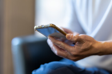 man using smart phone. The concept of living on vacation and playing social media. Social Distancing ,Working From Home