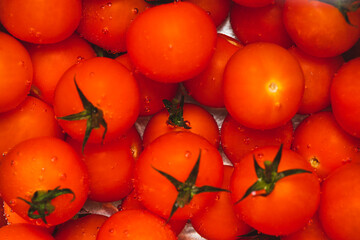 Cherry tomatoes covered with water