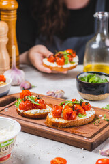 Bruschetta with ricotta and baked tomatoes