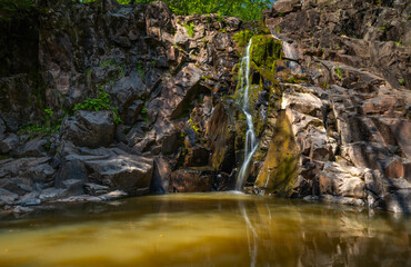 Tiny waterfall along the Split rock river famous trail