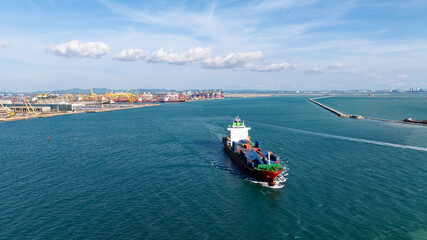 logistic cargo container ship sailing in sea to import export goods and distributing products to...