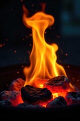 Close-up of vibrant, flickering grilling flames leaping and dancing over hot coals, creating a mesmerizing spectacle of heat and light Perfect for culinary and BBQ themes , burning, bonfire