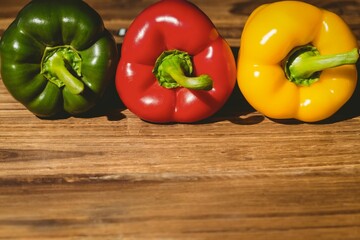 Arranged bell peppers on chopping board
