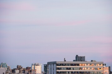 City against sky during sunset