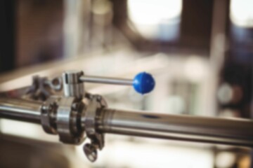 Handle on pipe in factory