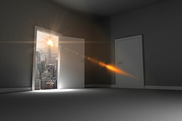 Open door on hill with cityscape and orange sunlight