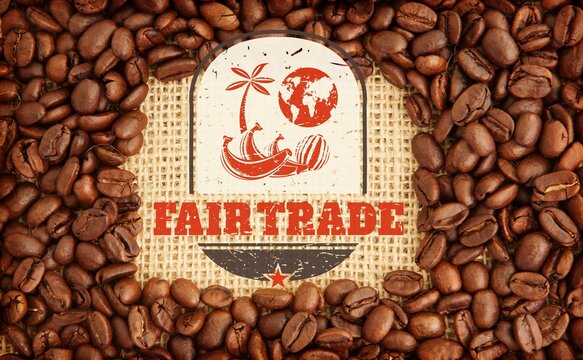 Flat-lay composition is showing fair trade emblem on burlap with coffee beans around edges