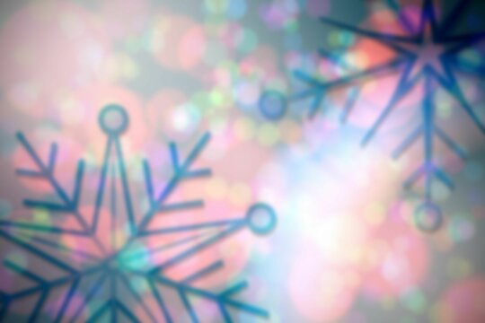 Fototapeta Pastel digital design is showcasing blue snowflake outlines over multicolor soft-focus bokeh lights