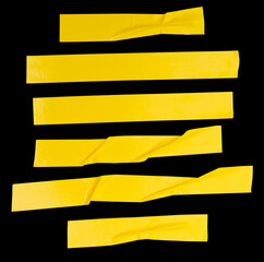 Top view set of wrinkled or crumpled yellow adhesive vinyl tape or cloth tape in stripes shape in...