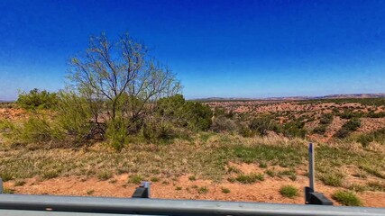 Texas Panhandle is characterized by dramatic canyon landforms, primarily due to the erosive power of rivers and wind over millions of years.