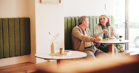 Eating, talk or old couple in cafe on date together in retirement for love, breakfast or food. Relax, chat or people on vacation in restaurant with lunch or care at diner for romantic anniversary