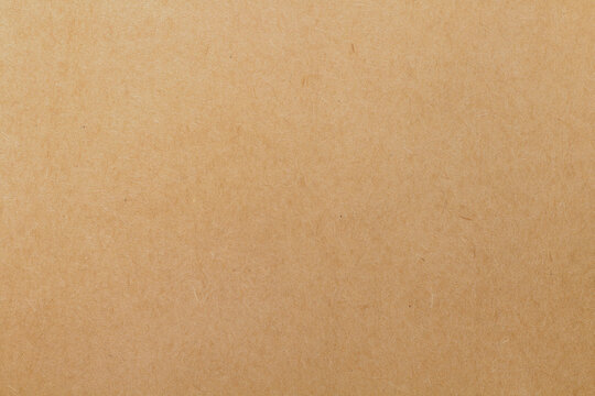 Cardboard sheet texture background, pattern of brown kraft paper with vintage style.