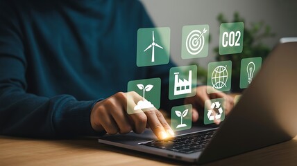 Person interacting with digital environmental icons on laptop hands typing