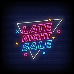 late night sale neon sign with brick wall background vector