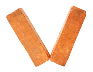 Side view of two cracked old red or orange bricks in stack isolated on white background with clipping path
