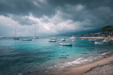 Calm turquoise bay with numerous small boats anchored under a dramatic, brooding sky; sandy beach in foreground