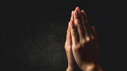 Praying hands in namaste gesture on dark background, symbol of faith, devotion, and belief in God, spiritual hope concept --ar 16:9