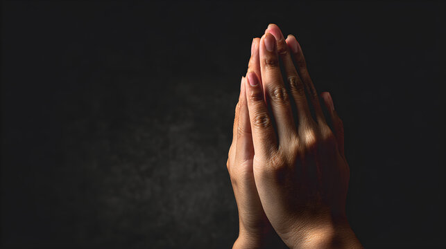 Praying hands in namaste gesture on dark background, symbol of faith, devotion, and belief in God, spiritual hope concept --ar 16:9
