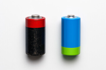 Fototapeta premium Old Battery and Modern Rechargeable Battery Comparison