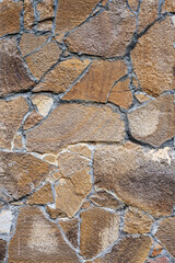 Texture of wall lined with natural stone. Template, background or wallpaper sample.